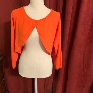 Cropped sweater overlay.